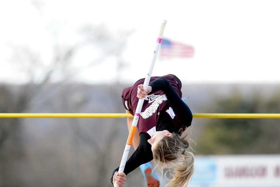 GIRLS TRACK AND FIELD JUMPING TO NEW HEIGHTS