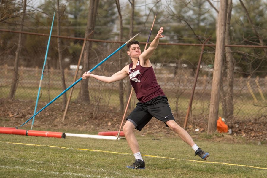 YEAH, I THROW. Senior Ryan Bailey gives it his all as he throws the javelin. Ryan threw a personal best at the league meet and placed third.
