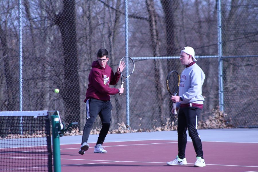 TEAMWORK! Seniors Sean Scholes and Andre Baadsvik play as a power doubles team. 
