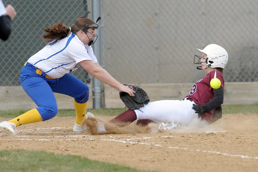 SAFE!
Sophomore Morgan Karasek (center field) steals home and makes it there safely to help the Slaters win the game. Karasek has a total of 23 stolen bases for the Slaters so far this season.  