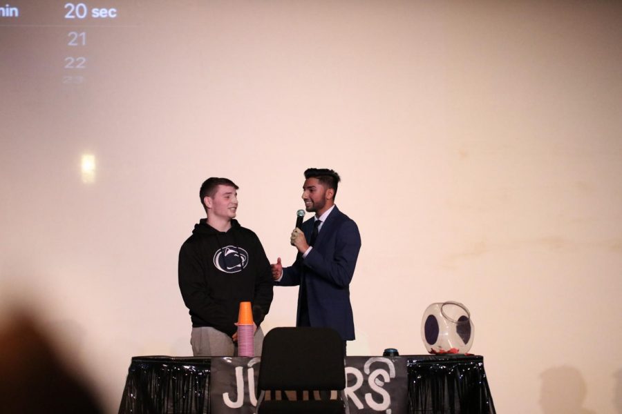 KNOCK KNOCK…. Joey Schrader and Akash Sareen makes a funny joke on stage to get a good laugh.