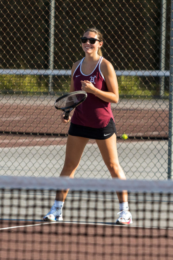 SLATER SMILES! Senior Katie Snyder flashes her game winning smile as she prepares for competition. Snyder was named a captain for her skill and excellent sportsmanship on and off the courts.  