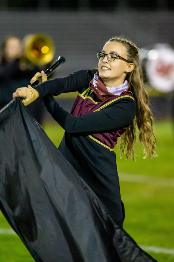 GRAB AND GO! Senior color guard flag master Avalon Sager perfectly executed her flag routine and looks to make a dramatic finish. Sager will turn in her Slater flag and transform into a Falcon next fall as she is committed to Cedar Crest College with a major of surgical nursing.  