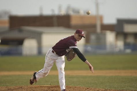 STRIKE! Sophomore pitcher Greg Campbell brings the heat on the mound against Palisades. Campbell is the Slaters’ starting pitcher. 
