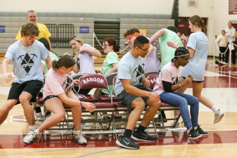 SCOOT OVER! Minithon participants engage in an intense battle of musical chairs. This was just one of the many fun activities at Minithon to help raise money for fighting against pediatric cancer.