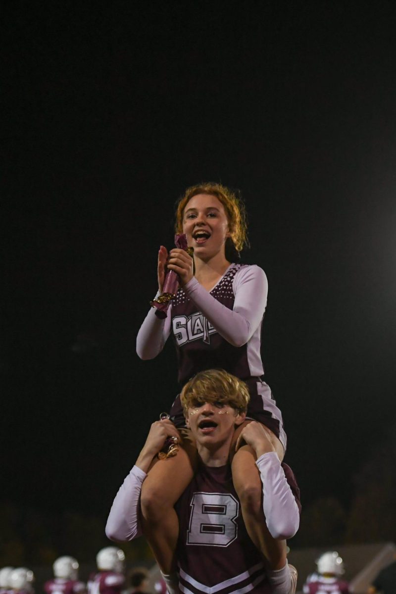 SLATER PRIDE
Hannah Martin and Callahan Karner, freshmen, exhibit their Slater pride as cheerleaders 