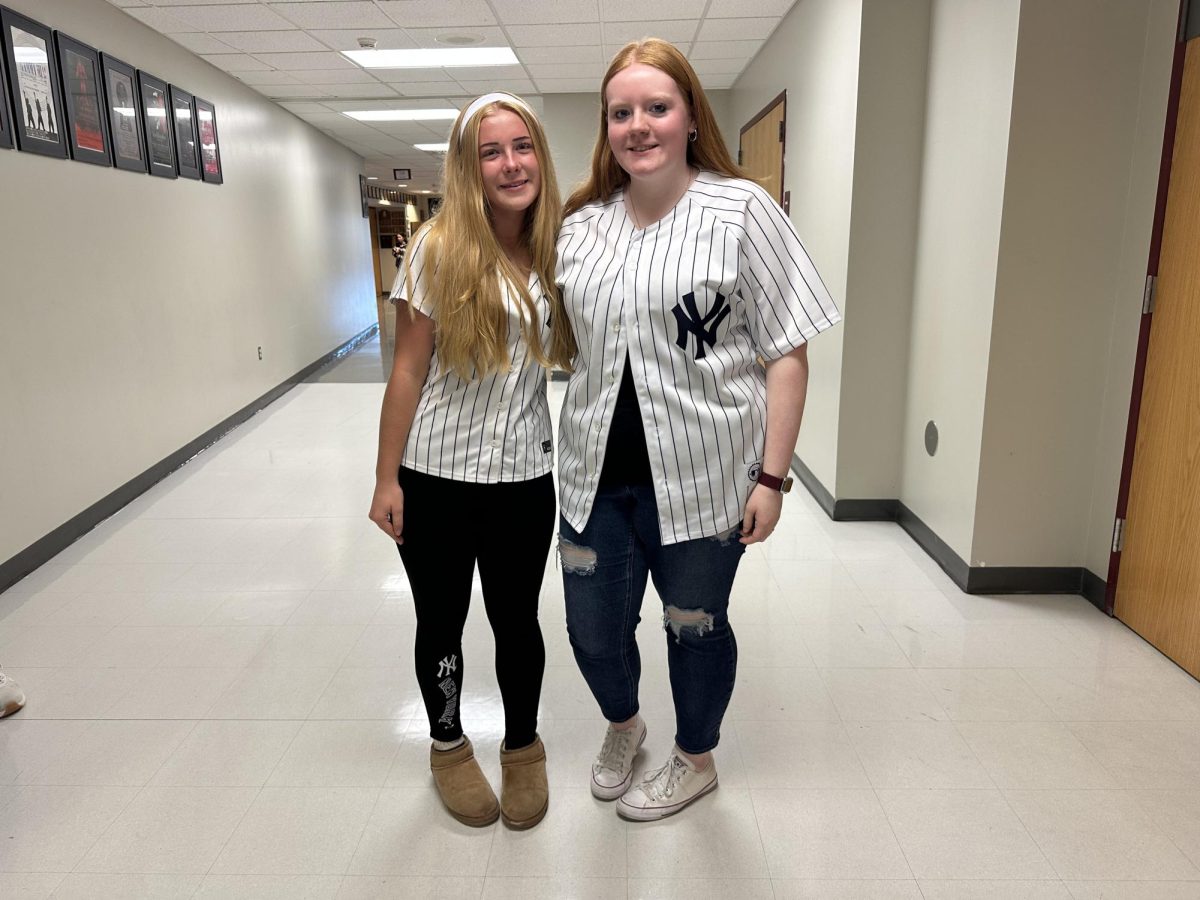SHOWING THEIR SPIRIT IN STYLE! These two Slaters dress up to bring the energy for the great big game. 